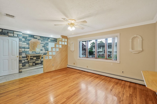 8 Adolphi Pl, Ronkonkoma, NY 11779 - unfurnished living room with hardwood / wood-style floors, baseboard heating, ceiling fan, crown molding, and a textured ceiling
