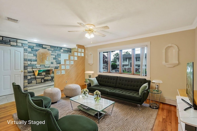 8 Adolphi Pl, Ronkonkoma, NY 11779 - living area with ceiling fan, ornamental molding, wood finished floors, baseboards, and baseboard heating
