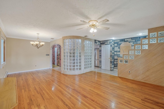 8 Adolphi Pl, Ronkonkoma, NY 11779 - spare room featuring light wood finished floors, a textured ceiling, baseboards, a ceiling fan, and a chandelier