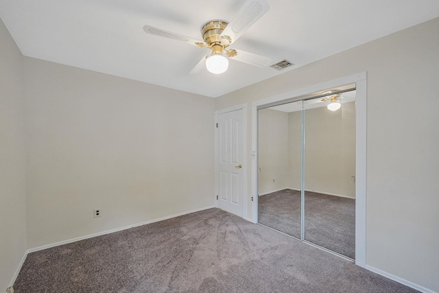 8 Adolphi Pl, Ronkonkoma, NY 11779 - unfurnished bedroom with carpet floors, a closet, baseboards, and a ceiling fan