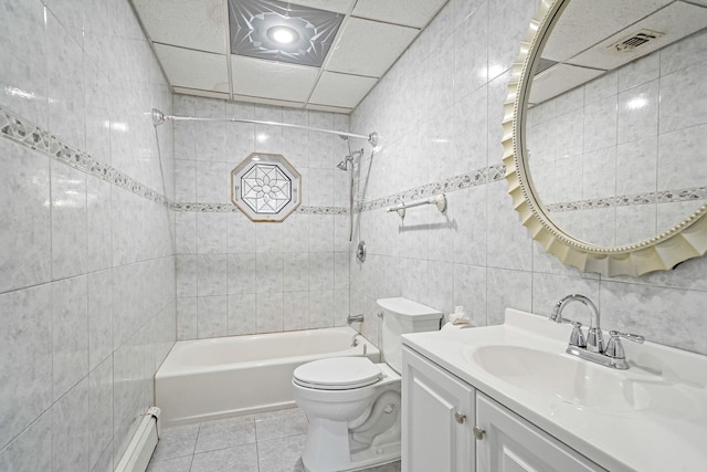8 Adolphi Pl, Ronkonkoma, NY 11779 - bathroom featuring tile walls, bathtub / shower combination, tile patterned floors, vanity, and toilet