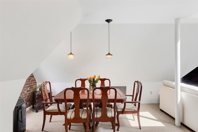 6 Davis Ave Unit A42, Rye, NY 10580 - dining space featuring vaulted ceiling, light carpet, and baseboards