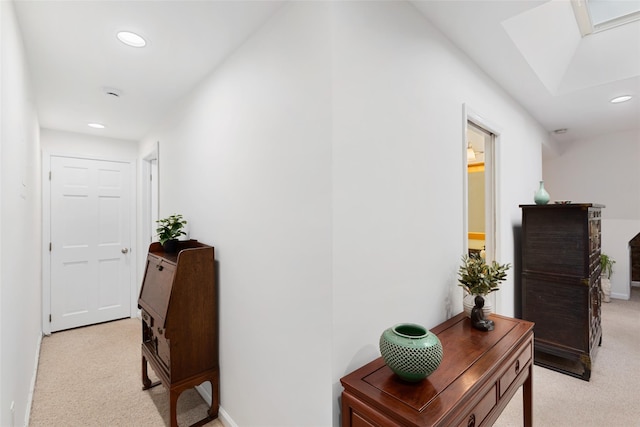 6 Davis Ave Unit A42, Rye, NY 10580 - corridor featuring a skylight, light colored carpet, recessed lighting, and baseboards