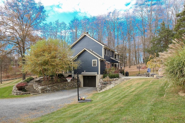 470 Winding Hill Rd, Montgomery, NY 12549 - view of side of property featuring stairway, driveway, a garage, and a lawn