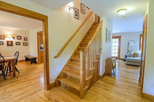 470 Winding Hill Rd, Montgomery, NY 12549 - stairway with wood finished floors and baseboards