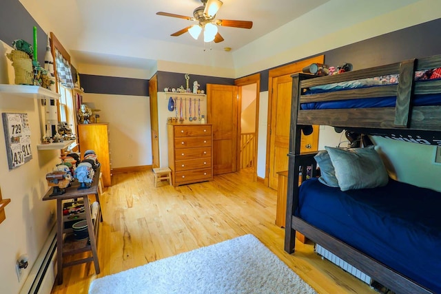470 Winding Hill Rd, Montgomery, NY 12549 - bedroom featuring a baseboard radiator and light wood-style floors