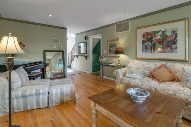 26 Mayberry Rd, Chappaqua, NY 10514 - living area featuring crown molding, stairway, wood finished floors, baseboards, and recessed lighting