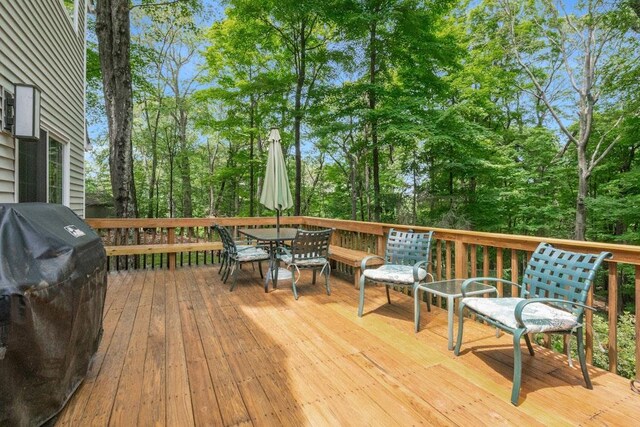 26 Mayberry Rd, Chappaqua, NY 10514 - wooden terrace featuring grilling area, outdoor dining area, and view of wooded area