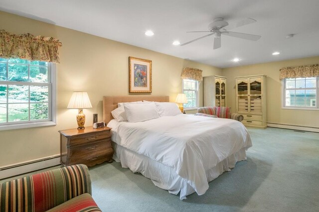 26 Mayberry Rd, Chappaqua, NY 10514 - carpeted bedroom featuring a baseboard heating unit, recessed lighting, and ceiling fan
