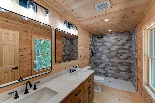 57 Zane Grey Way, Barryville, NY 12719 - full bathroom with wooden ceiling, toilet, wood walls, double vanity, and tiled shower