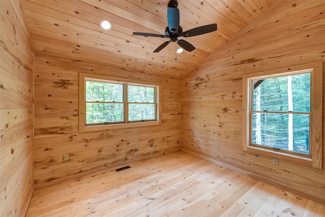 57 Zane Grey Way, Barryville, NY 12719 - empty room with vaulted ceiling, light wood-type flooring, wooden walls, a ceiling fan, and wooden ceiling