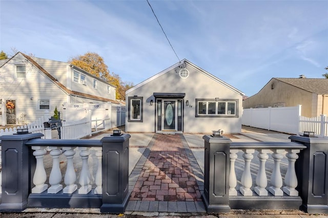24 Commander Ave, Hempstead, NY 11550 - view of front facade featuring a patio