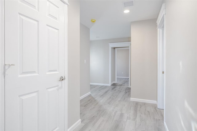 24 Commander Ave, Hempstead, NY 11550 - corridor featuring baseboards, light wood finished floors, and recessed lighting