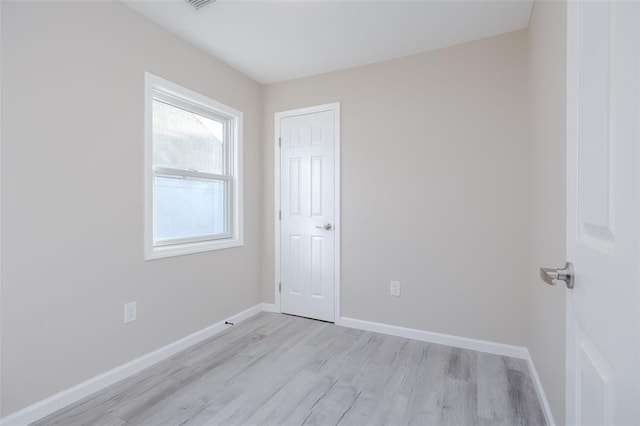 24 Commander Ave, Hempstead, NY 11550 - empty room with light wood-type flooring and baseboards