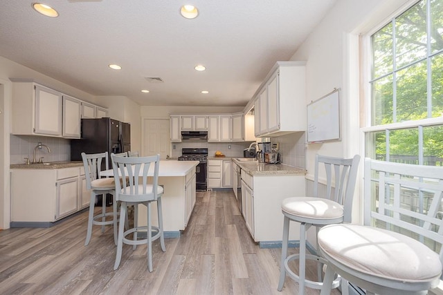 20 Hawk Nest Rd, Tomkins Cove, NY 10986 - kitchen featuring gas stove, under cabinet range hood, healthy amount of natural light, a sink, and recessed lighting