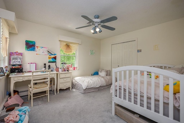 20 Hawk Nest Rd, Tomkins Cove, NY 10986 - carpeted bedroom featuring a baseboard heating unit, ceiling fan, a desk, and a textured ceiling