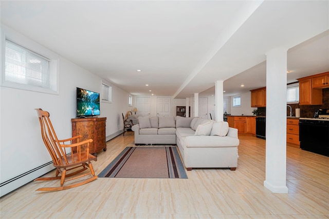 39 Summit Ave, Staten Island, NY 10306 - living area with recessed lighting, a baseboard heating unit, and light wood finished floors