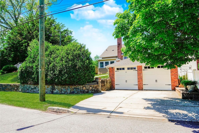 39 Summit Ave, Staten Island, NY 10306 - obstructed view of property with brick siding, a front lawn, and roof with shingles