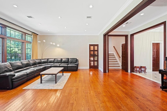 23 Tanners Rd, Great Neck, NY 11020 - living room featuring stairs, crown molding, light wood-style flooring, recessed lighting, and baseboards