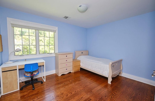 23 Tanners Rd, Great Neck, NY 11020 - bedroom featuring wood finished floors and baseboards