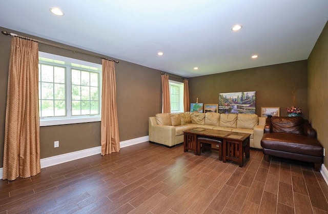 23 Tanners Rd, Great Neck, NY 11020 - living area with baseboards, dark wood-style flooring, and recessed lighting