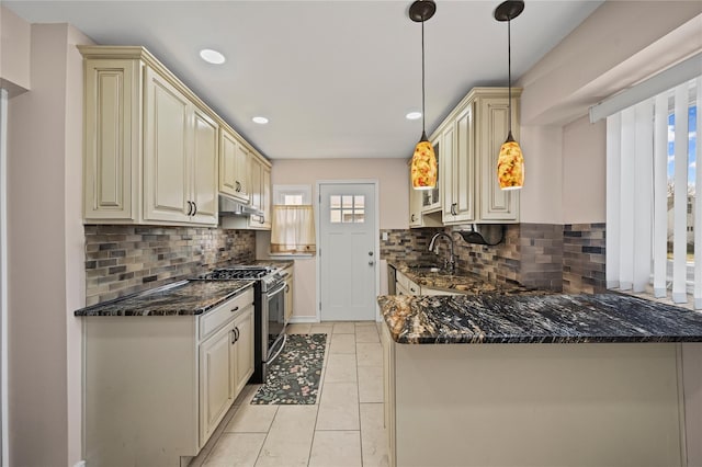 15 Salem Rd, Hicksville, NY 11801 - kitchen featuring gas stove, cream cabinetry, plenty of natural light, under cabinet range hood, and recessed lighting