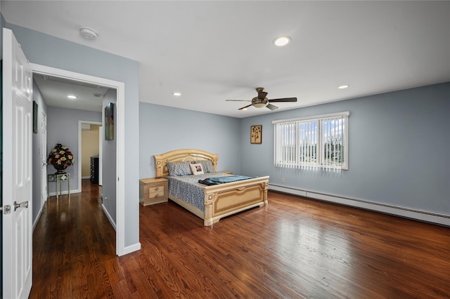 15 Salem Rd, Hicksville, NY 11801 - bedroom with wood finished floors, recessed lighting, a baseboard heating unit, and a ceiling fan