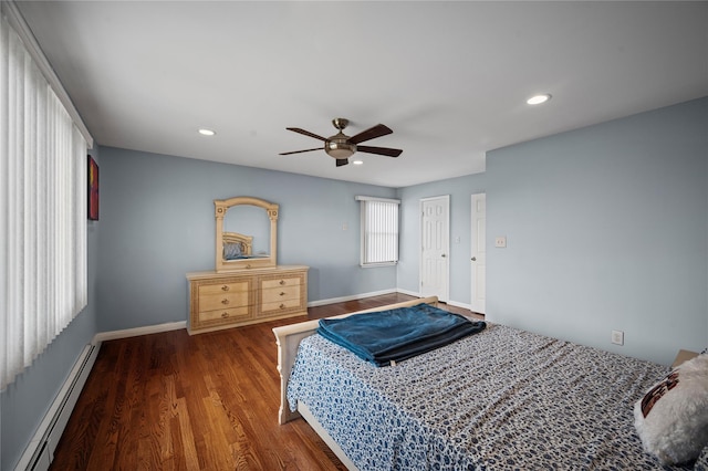 15 Salem Rd, Hicksville, NY 11801 - bedroom with baseboard heating, ceiling fan, wood finished floors, and recessed lighting