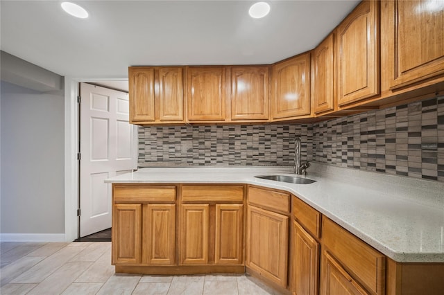 15 Salem Rd, Hicksville, NY 11801 - kitchen with light countertops, tasteful backsplash, and brown cabinets