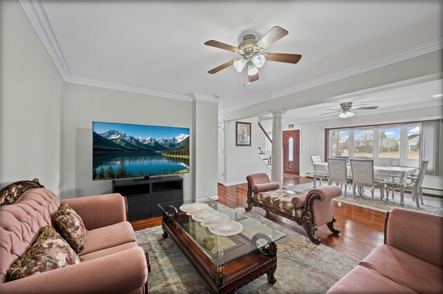 15 Salem Rd, Hicksville, NY 11801 - living area with ceiling fan, stairway, ornamental molding, wood finished floors, and decorative columns