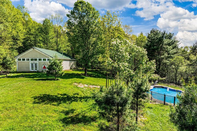 336 County Highway 5, Bovina Center, NY 13740 - view of grassy yard with french doors and a forest view