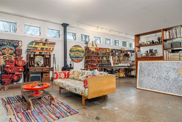 336 County Highway 5, Bovina Center, NY 13740 - living area featuring concrete flooring and rail lighting