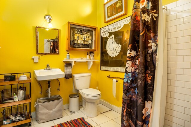 336 County Highway 5, Bovina Center, NY 13740 - bathroom with toilet, tile patterned floors, a shower with curtain, and a sink