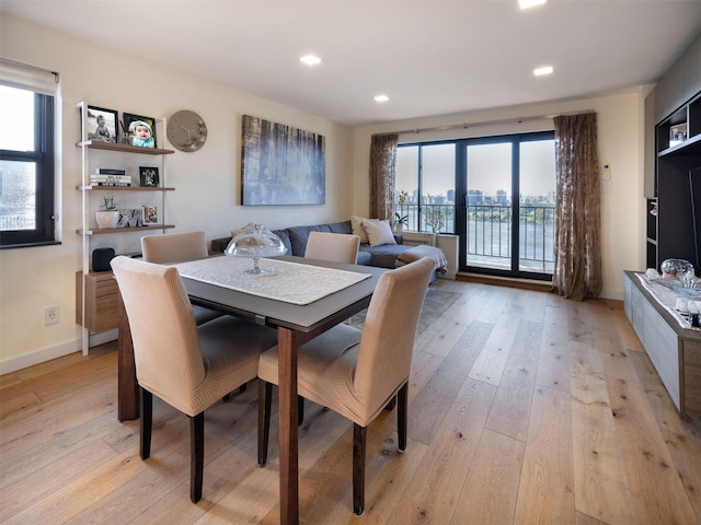 25-40 Shore Blvd Unit 17K, Astoria, NY 11102 - dining area featuring light wood-style floors, recessed lighting, and baseboards