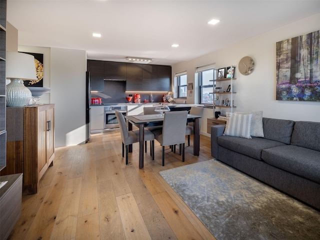 25-40 Shore Blvd Unit 17K, Astoria, NY 11102 - living area featuring light wood-style flooring and recessed lighting