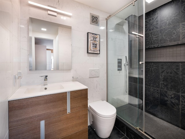 25-40 Shore Blvd Unit 17K, Astoria, NY 11102 - full bathroom featuring tile walls, vanity, toilet, and a stall shower