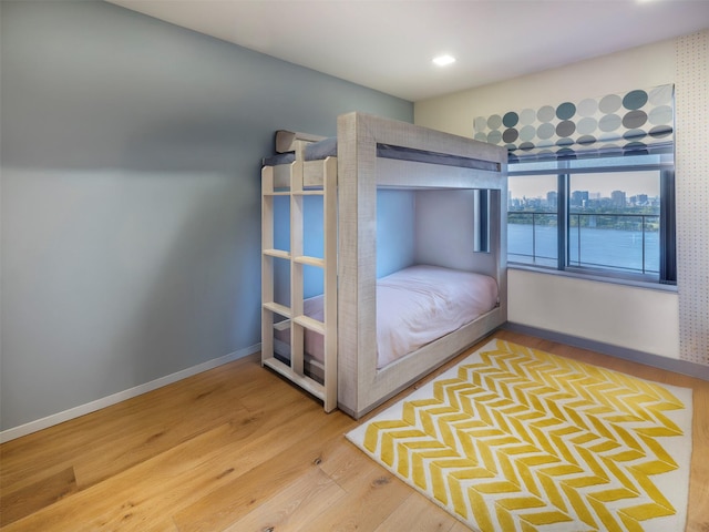 25-40 Shore Blvd Unit 17K, Astoria, NY 11102 - bedroom featuring wood finished floors and baseboards