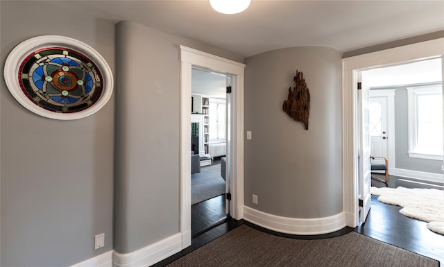 87 River Rd, Nyack, NY 10960 - corridor with baseboards and dark wood finished floors