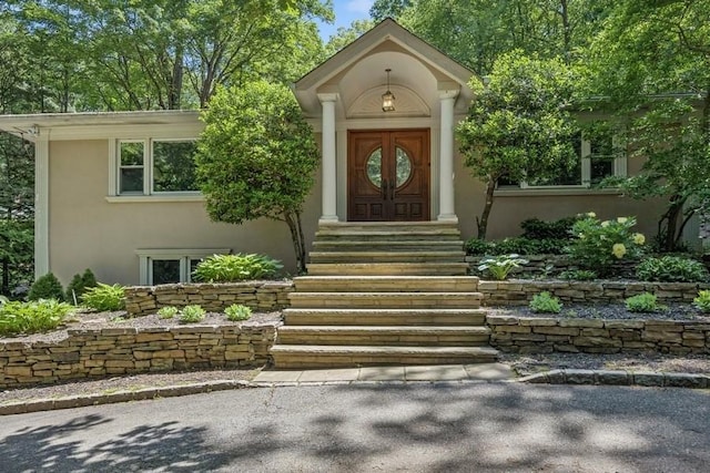 76 Stony Hollow Rd, Centerport, NY 11721 - property entrance with stucco siding