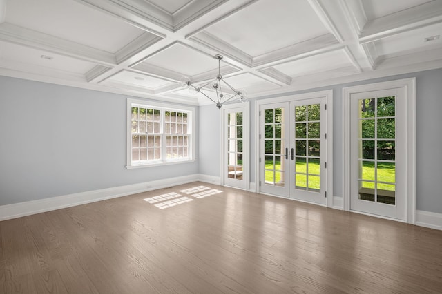 8 E Huxley Dr, Lloyd Harbor, NY 11743 - unfurnished sunroom featuring french doors, coffered ceiling, a chandelier, and beam ceiling