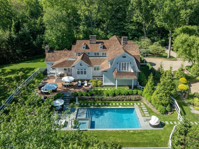 8 E Huxley Dr, Lloyd Harbor, NY 11743 - view of subject property featuring a pool