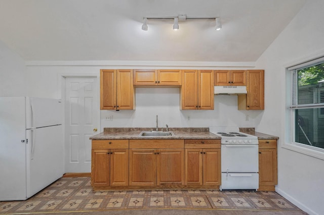 34 Ridgedale Ave, Farmingville, NY 11738 - kitchen featuring white appliances, a sink, rail lighting, under cabinet range hood, and light flooring