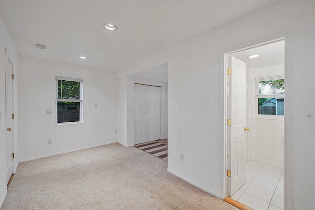 34 Ridgedale Ave, Farmingville, NY 11738 - empty room with baseboards, recessed lighting, and light colored carpet