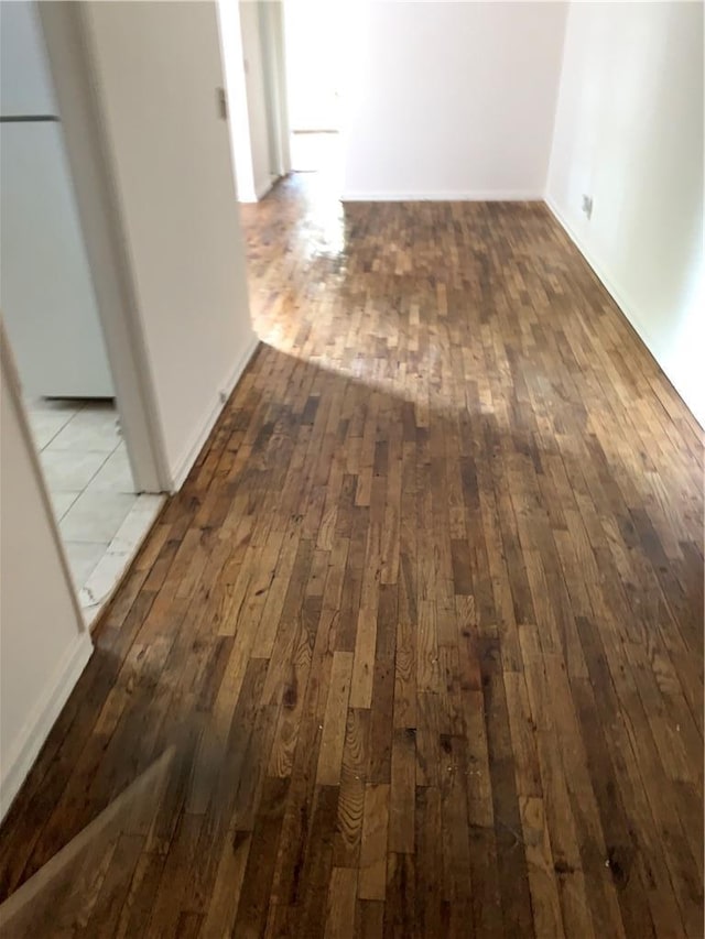 30 Davenport Ave Unit 1L, New Rochelle, NY 10805 - hallway with hardwood / wood-style floors and baseboards