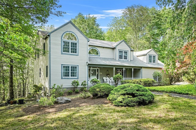 57 Wilner Rd, Somers, NY 10589 - view of front of house with covered porch and a front yard