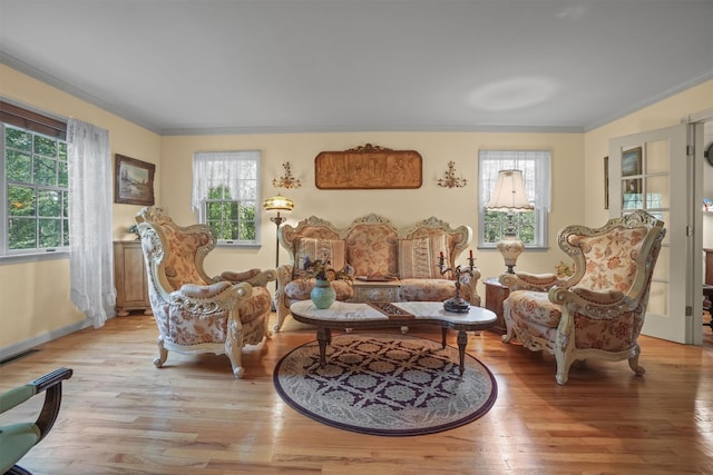 57 Wilner Rd, Somers, NY 10589 - living room with ornamental molding, light wood-style floors, and baseboards