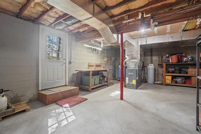 57 Wilner Rd, Somers, NY 10589 - basement with concrete block wall, heating unit, and a water softener