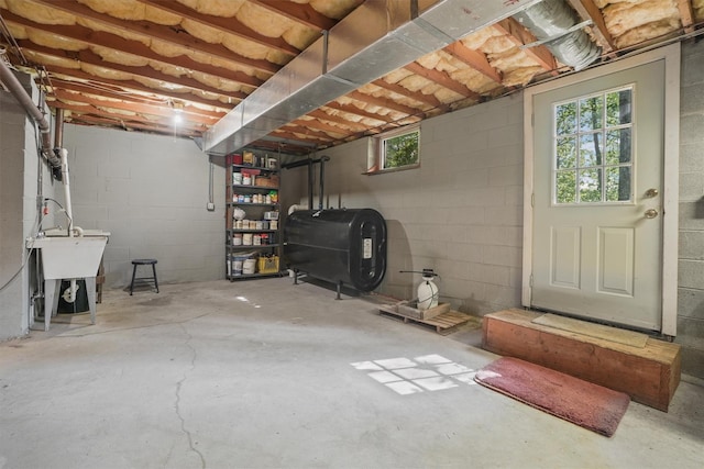 57 Wilner Rd, Somers, NY 10589 - basement with heating fuel, concrete block wall, and a sink