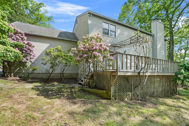 57 Wilner Rd, Somers, NY 10589 - back of house with a chimney, a deck, and stairs