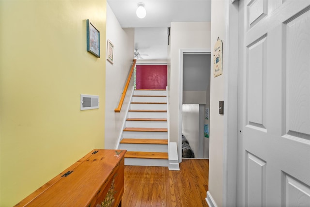 1009 Ethan Allen Dr Unit 1009, New Windsor, NY 12553 - staircase with a ceiling fan and wood finished floors